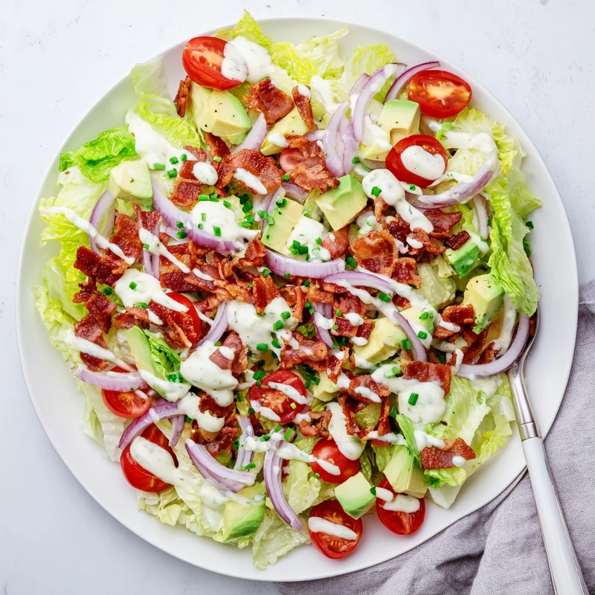 Healthy Crispy Bacon Keto BLT Salad with vibrant greens and tomatoes, ready for a low-carb lunch or dinner.